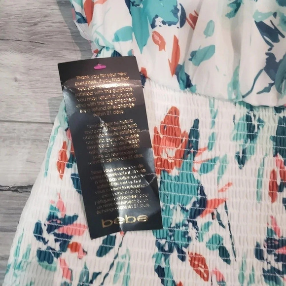NWT Bebe Printed Smocked Tiered Mini Dress,Tropical Garden,Green/White/Orange. - Picture 6 of 11